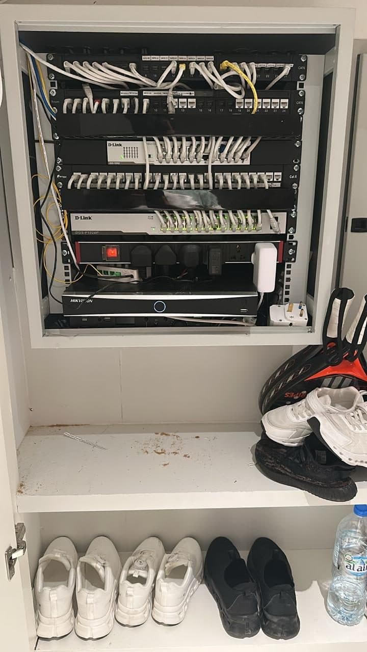 Patch panels, network switches and an NVR installed in a dedicated structured cabling closet.